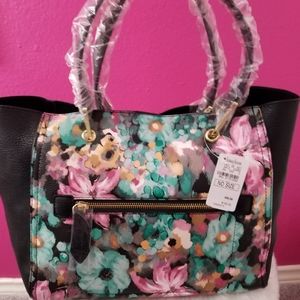 Neiman Marcus bag with leather straps and gold hardware